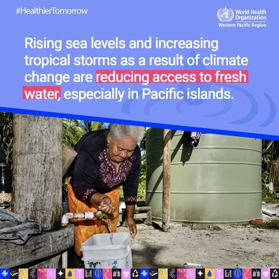 Woman collecting water from an outside tap