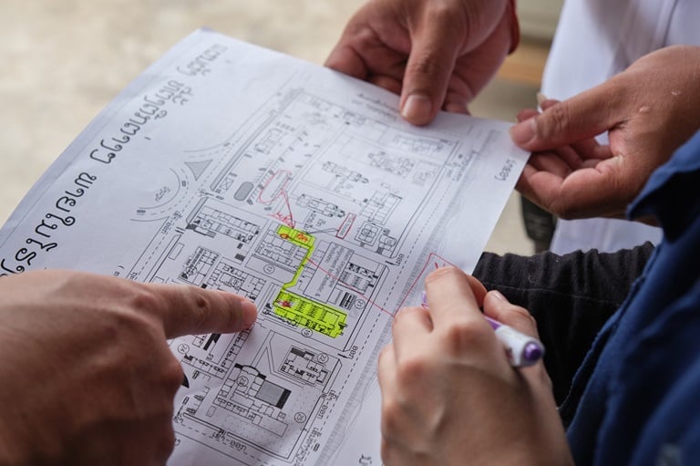 man checking the oxygen tanks